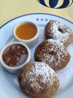 Cinnamon beignets with peach jam, Nutella and a black Americano coffee