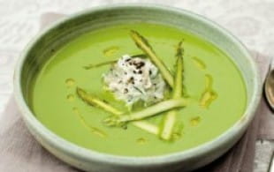 Asparagus soup topped with ricotta, chives and crispy chicken