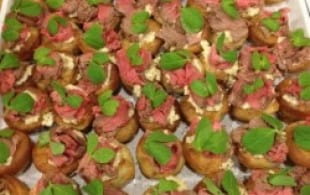 Mini Yorkshire puddings with rare fillet of beef and Central Otago Pinot Noir