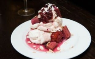 Walnut meringue cake with buttermilk cream and poached rhubarb 